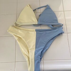 Brand new, never worn Aurelle swim suit with small stain in right breast